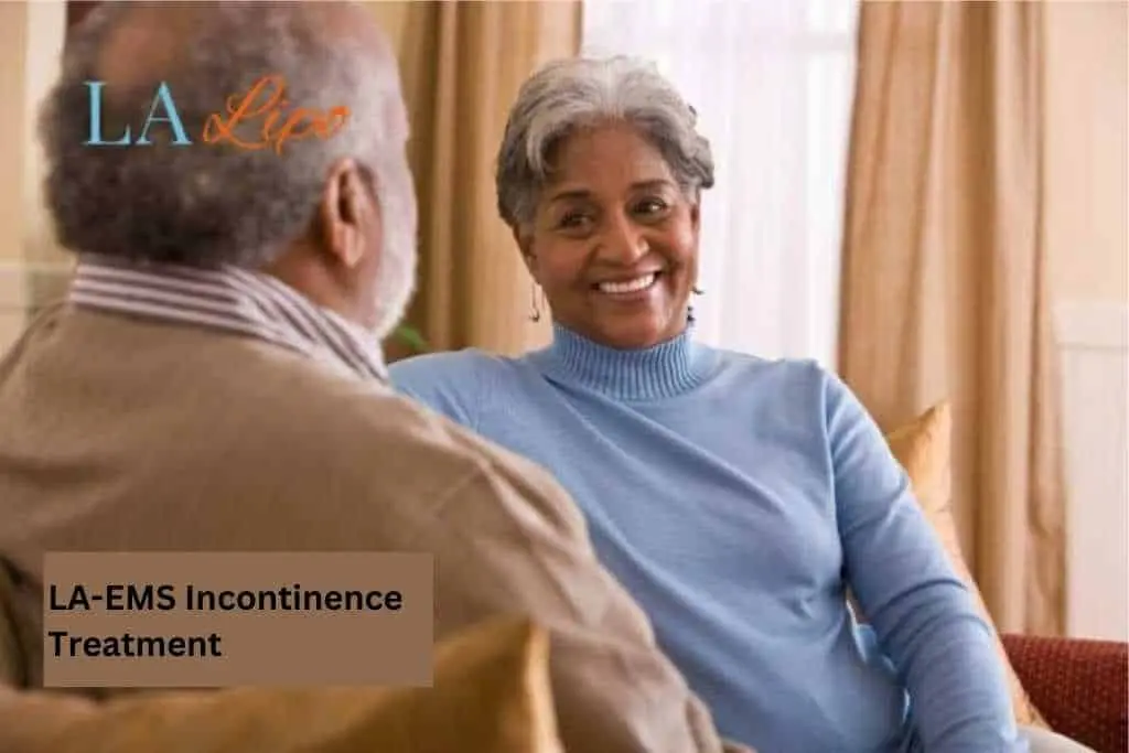 Couple sat smiling at each other - LA-EMS treatment Greater London (Redbridge)