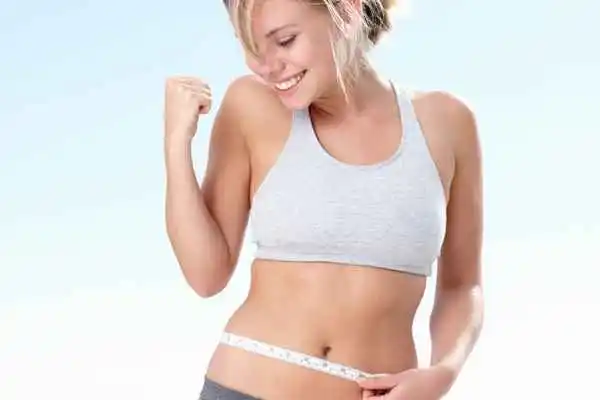woman happy after fat reduction treatment Greater London (Redbridge)