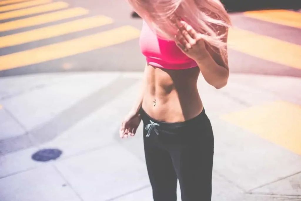 Woman with toned stomach after LA-EMS Body Sculpting Treatment Greater London (Redbridge) 