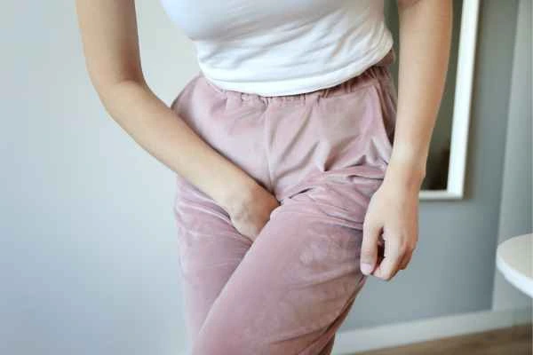 woman running for the toilet because of urinary incontinence Greater London (Redbridge)